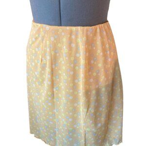 Yellow daisy preppy skirt with lettuce hem from ASOS.